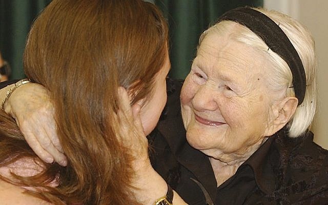 In this Monday, May 30, 2005 photo, Irena Sendler, right, a Polish woman who saved the lives of hundreds of Jewish children during World War II, meets with American students who created a play about her life, in Warsaw, Poland. (AP/Czarek Sokolowski) In this Monday, May 30, 2005 photo, Irena Sendler, right, a Polish woman who saved the lives of hundreds of Jewish children during World War II, meets with American students who created a play about her life, in Warsaw, Poland. (AP/Czarek Sokolowski)