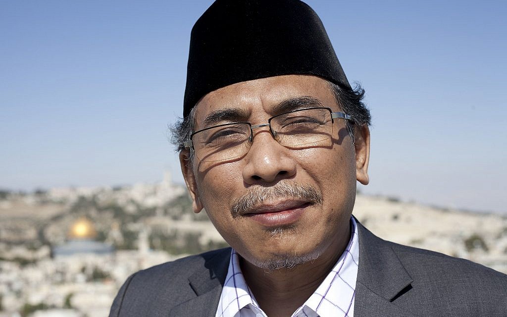 Yahya Staquf, secretary general of the 60 million member Nahdlatul Ulama poses for a photograph, overlooking Jerusalem, June 11, 2018. (AP Photo/Caron Craighton) Yahya Staquf, secretary general of the 60 million member Nahdlatul Ulama poses for a photograph, overlooking Jerusalem, June 11, 2018. (AP Photo/Caron Craighton)