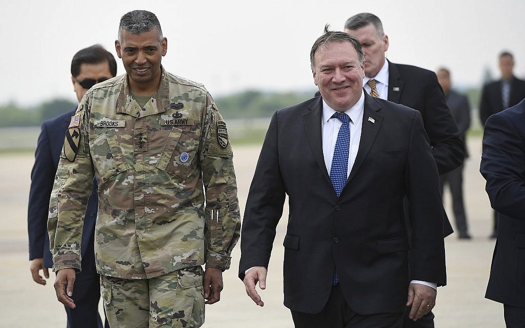 U.S. Secretary of State Mike Pompeo, right, walks with U.S. General Vincent K. Brooks, left, commander of United States Forces Korea, upon his arrival at Osan Air Base in Pyeongtaek, on June 13, 2018. (Jung Yeon-je/Pool Photo via AP) U.S. Secretary of State Mike Pompeo, right, walks with U.S. General Vincent K. Brooks, left, commander of United States Forces Korea, upon his arrival at Osan Air Base in Pyeongtaek, on June 13, 2018. (Jung Yeon-je/Pool Photo via AP)