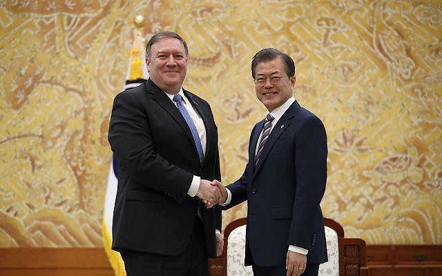 US Secretary of State Mike Pompeo, left, poses with South Korean President Moon Jae-in for a photo during a bilateral meeting at the presidential Blue House in Seoul, South Korea June 14, 2018. (Kim Hong-ji/Pool Photo via AP) US Secretary of State Mike Pompeo, left, poses with South Korean President Moon Jae-in for a photo during a bilateral meeting at the presidential Blue House in Seoul, South Korea June 14, 2018. (Kim Hong-ji/Pool Photo via AP)