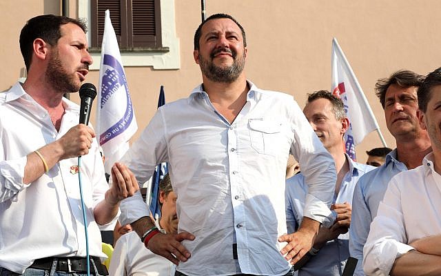 Italian Interior Minister Matteo Salvini, center, attends a local election rally in Cinisello Balsamo, near Milan, Italy, June 17, 2018 (Matteo Bazzi/ANSA via AP) Italian Interior Minister Matteo Salvini, center, attends a local election rally in Cinisello Balsamo, near Milan, Italy, June 17, 2018 (Matteo Bazzi/ANSA via AP)