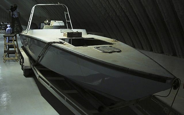 A boat that defense officials described as being a "drone boat" once loaded with explosives by Shiite rebels in Yemen, is on display at a military installation in the United Arab Emirates Tuesday, June 19, 2018. (AP Photo/Jon Gambrell) A boat that defense officials described as being a "drone boat" once loaded with explosives by Shiite rebels in Yemen, is on display at a military installation in the United Arab Emirates Tuesday, June 19, 2018. (AP Photo/Jon Gambrell)