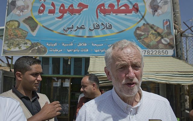 UK Labour Party leader Jeremy Corbyn walks in the main market road during his visit to the Zaatari Syrian Refugee Camp, in Mafraq, Jordan, June 22, 2018. (AP Photo/Nasser Nasser) UK Labour Party leader Jeremy Corbyn walks in the main market road during his visit to the Zaatari Syrian Refugee Camp, in Mafraq, Jordan, June 22, 2018. (AP Photo/Nasser Nasser)