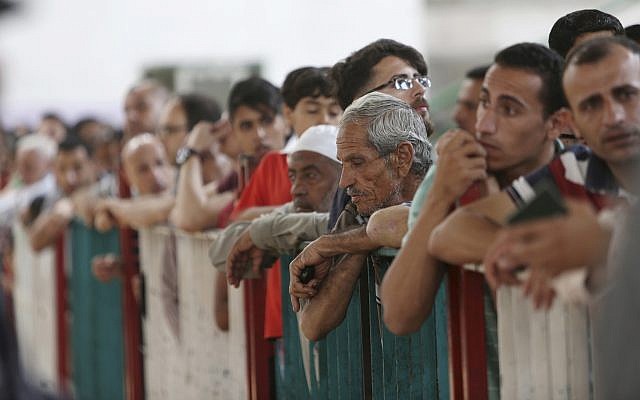 Illustrative: This May 22, 2018, file photo shows Palestinians waiting to cross the Gaza-Egypt border to the Egyptian side at the Rafah crossing. (AP Photo/Adel Hana, File) Illustrative: This May 22, 2018, file photo shows Palestinians waiting to cross the Gaza-Egypt border to the Egyptian side at the Rafah crossing. (AP Photo/Adel Hana, File)