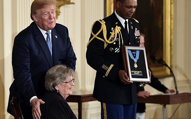 US President Donald Trump, before he awards the Medal of Honor to 1st Lt. Garlin Conner,a posthumous recognition accepted by his widow Pauline Conner, during a ceremony in the East Room of the White House in Washington, DC, June 26, 2018. (AP Photo/ Susan Walsh) US President Donald Trump, before he awards the Medal of Honor to 1st Lt. Garlin Conner,a posthumous recognition accepted by his widow Pauline Conner, during a ceremony in the East Room of the White House in Washington, DC, June 26, 2018. (AP Photo/ Susan Walsh)