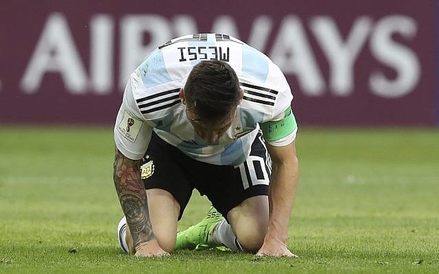 Argentina's Lionel Messi kneels on the pitch during the round of 16 match between France and Argentina, at the 2018 soccer World Cup at the Kazan Arena in Kazan, Russia, on June 30, 2018. (AP Photo/Thanassis Stavrakis) Argentina's Lionel Messi kneels on the pitch during the round of 16 match between France and Argentina, at the 2018 soccer World Cup at the Kazan Arena in Kazan, Russia, on June 30, 2018. (AP Photo/Thanassis Stavrakis)