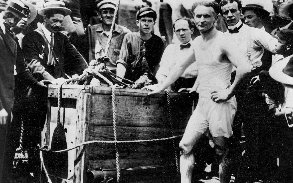 Escape artist Harry Houdini is shown before being lowered in a packing crate into the ice-covered Detroit River in 1907. (AP Photo)
