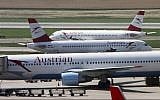 Austrian Airlines planes stand at Vienna-Schwechat airport in Vienna, Austria. (AP Photo/Ronald Zak, File)