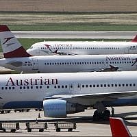Austrian Airlines planes stand at Vienna-Schwechat airport in Vienna, Austria. (AP Photo/Ronald Zak, File)