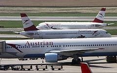 Austrian Airlines planes stand at Vienna-Schwechat airport in Vienna, Austria. (AP Photo/Ronald Zak, File)