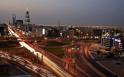 Saudi Arabian city view with the Kingdom Tower, background, and 'Al-Faislia Tower' in Riyadh, Saudi Arabia, February 9, 2011. (AP Photo/Hassan Ammar)