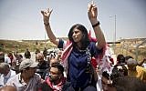 Palestinian lawmaker Khalida Jarrar is greeted by supporters near the West Bank town of Tulkarem, on June 3, 2016. (Majdi Mohammed/AP)