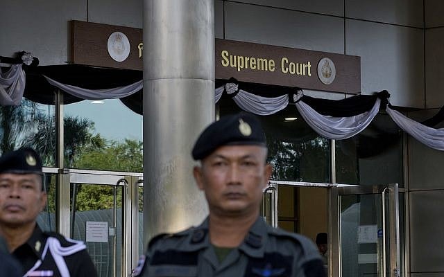 Illustrative: A Thai police officers stand guard outside a courthouse Wednesday, Aug. 2, 2017, in Bangkok, Thailand (AP Photo/Gemunu Amarasinghe) Illustrative: A Thai police officers stand guard outside a courthouse Wednesday, Aug. 2, 2017, in Bangkok, Thailand (AP Photo/Gemunu Amarasinghe)
