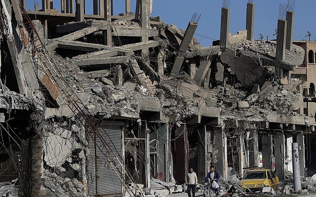 In this Thursday, April 5, 2018 photo, rubble of buildings line a street that was damaged during fighting between US-backed Syrian Democratic Forces fighters and Islamic State militants, in Raqqa, Syria.(AP/Hussein Malla) In this Thursday, April 5, 2018 photo, rubble of buildings line a street that was damaged during fighting between US-backed Syrian Democratic Forces fighters and Islamic State militants, in Raqqa, Syria.(AP/Hussein Malla)