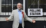 Illustrative: Britain's opposition Labour Party leader Jeremy Corbyn poses for photographers as he arrives to cast his vote for local council elections at a polling station in Holloway, London, May 3, 2018. (Victoria Jones/PA via AP)