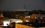 Illustrative. Smoke rises following an Israeli strikes on Gaza City, on May 30, 2018, after Palestinian terrorist groups bombarded southern Israel with dozens of rockets and mortar shells. (AP Photo/Hatem Moussa)