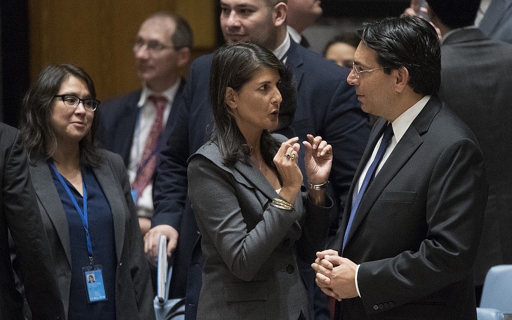 US Ambassador to the United Nations Nikki Haley, left, speaks to former Israeli ambassador to the United Nations Danny Danon before a Security Council meeting on the situation on the Gaza border, June 1, 2018 at United Nations headquarters. (AP Photo/Mary Altaffer)