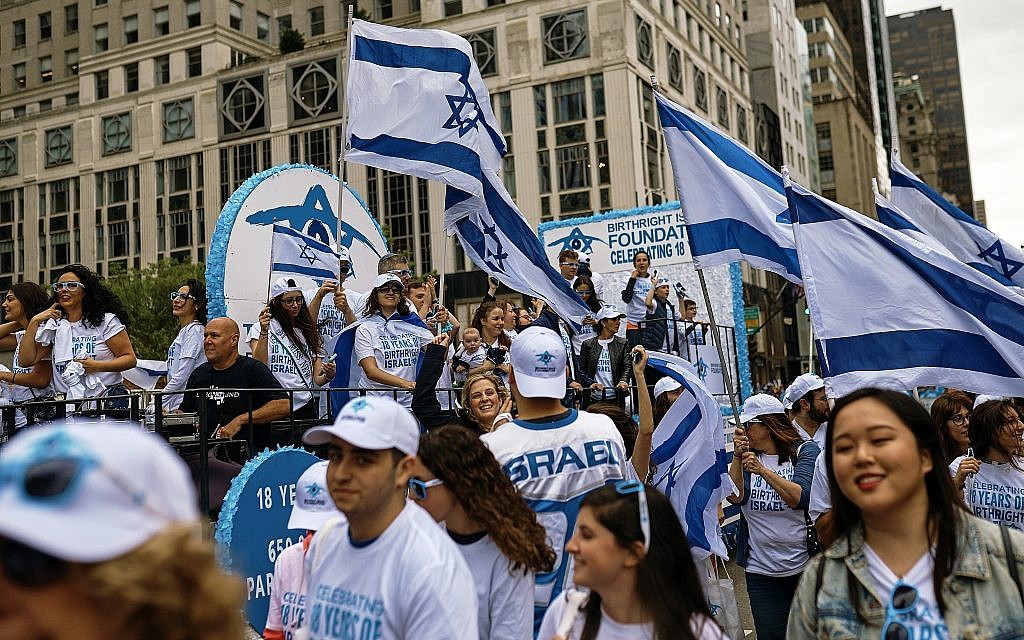 People carry Israeli flags as they march during the annual Celebrate Israel Parade, June 3, 2018, in New York. (AP Photo/Andres Kudacki) People carry Israeli flags as they march during the annual Celebrate Israel Parade, June 3, 2018, in New York. (AP Photo/Andres Kudacki)