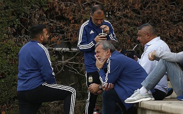 President of the Argentine Football Association Claudio Tapia, right, takes a drink during a team training session at the Sports Center FC Barcelona Joan Gamper, in Sant Joan Despi, Spain, June 6, 2018. (AP Photo/Manu Fernandez) President of the Argentine Football Association Claudio Tapia, right, takes a drink during a team training session at the Sports Center FC Barcelona Joan Gamper, in Sant Joan Despi, Spain, June 6, 2018. (AP Photo/Manu Fernandez)