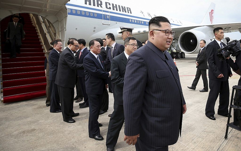 In this photo released by the Ministry of Communications and Information of Singapore, North Korean leader Kim Jong Un, right, arrives at the Changi International Airport, June 10, 2018, in Singapore ahead of a summit with US President Donald Trump. (Ministry of Communications and Information of Singapore via AP) In this photo released by the Ministry of Communications and Information of Singapore, North Korean leader Kim Jong Un, right, arrives at the Changi International Airport, June 10, 2018, in Singapore ahead of a summit with US President Donald Trump. (Ministry of Communications and Information of Singapore via AP)