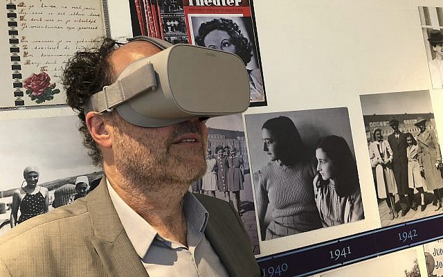 Ronald Leopold, executive director of the Anne Frank House, views a new virtual reality presentation of the secret rooms where teenage Jewish diarist Anne Frank hid from the Nazis during World War II, in Amsterdam on June 12, 2018. (Aleksandar Furtula/AP Photo) Ronald Leopold, executive director of the Anne Frank House, views a new virtual reality presentation of the secret rooms where teenage Jewish diarist Anne Frank hid from the Nazis during World War II, in Amsterdam on June 12, 2018. (Aleksandar Furtula/AP Photo)