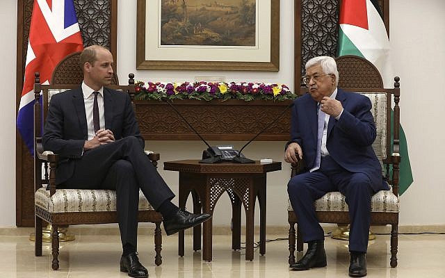 Britain's Prince William, left, and Palestinian Authority President Mahmoud Abbas meet in the West Bank city of Ramallah, Wednesday, June 27, 2018. (Alaa Badarneh/Pool Photo via AP)