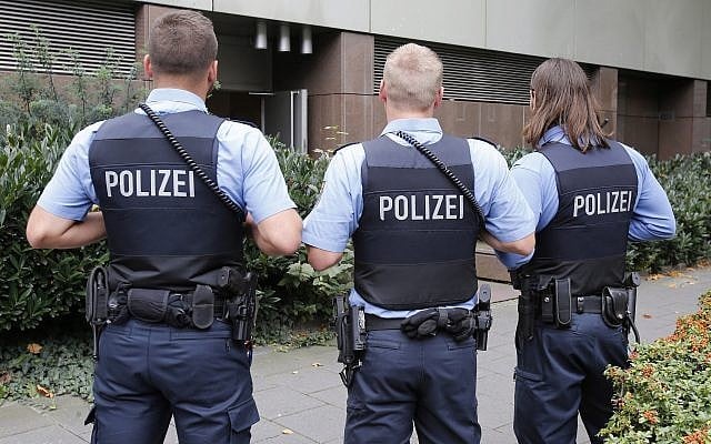 Illustrative: German police officers on guard outside the regional court in Frankfurt, Germany, September 15, 2014. (Michael Probst/AP) Illustrative: German police officers on guard outside the regional court in Frankfurt, Germany, September 15, 2014. (Michael Probst/AP)