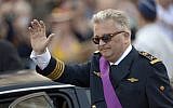 Belgium's Prince Laurent waves as he leaves a church service at the St. Gudule cathedral in Brussels on Sunday, July 21, 2013 (AP Photo/Ezequiel Scagnetti)