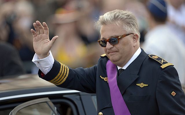 Belgium's Prince Laurent waves as he leaves a church service at the St. Gudule cathedral in Brussels on Sunday, July 21, 2013 (AP Photo/Ezequiel Scagnetti) Belgium's Prince Laurent waves as he leaves a church service at the St. Gudule cathedral in Brussels on Sunday, July 21, 2013 (AP Photo/Ezequiel Scagnetti)