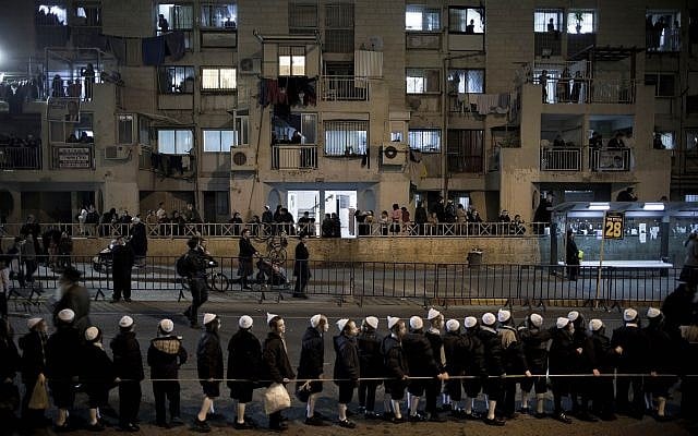 Illustrative: Ultra Orthodox Jews belonging to the Satmar Hasidic group headed by Satmar Admor of Williamsburg, Rabbi Zalman Leib Teitelbaum, wait for his arrival in the Ultra Orthodox Jewish neighborhood of Mea Shearim in Jerusalem, Sunday, Jan. 20, 2013. (AP Photo/Oded Balilty)