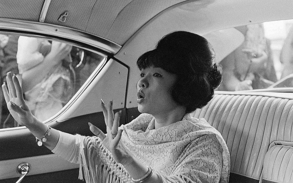 Madame Ngo Dinh Nhu, sister-in-law of Vietnamese President Ngo Dinh Diem, leaves a beauty shop in Rome, Italy, Sept. 26, 1963, after getting an Italian style hairdo. (AP Photo)
