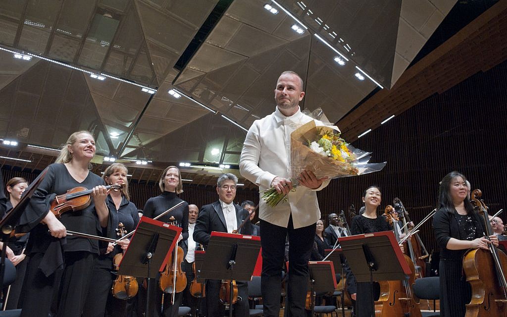 The Philadelphia Orchestra, with conductor Yannick Nezet-Seguin, after performing at the Bronfman Auditorium in Tel Aviv on June 4, 2018. (Maxim Reider/courtesy) The Philadelphia Orchestra, with conductor Yannick Nezet-Seguin, after performing at the Bronfman Auditorium in Tel Aviv on June 4, 2018. (Maxim Reider/courtesy)