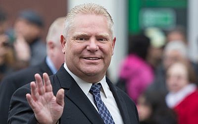 File: Ontario premier-elect Doug Ford at the 2014 Good Friday procession in East York, Canada. (Wikipedia/Bruce Reeve/CC BY)