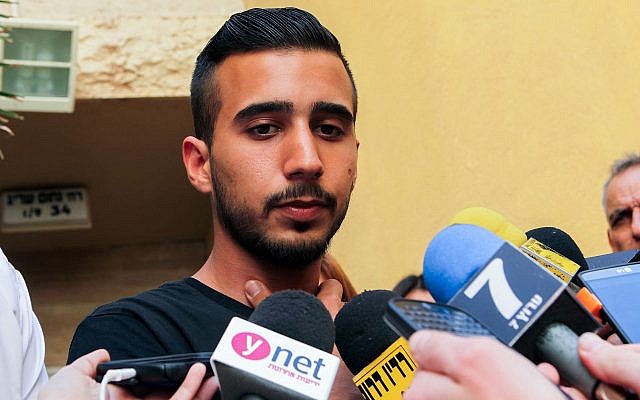 Niv Asraf speaks to press outside his family home in Beersheba on April 6, 2015. (Flash90) Niv Asraf speaks to press outside his family home in Beersheba on April 6, 2015. (Flash90)
