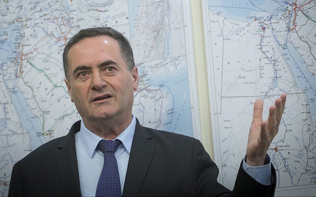 Transportation Minister Israel Katz in front of a map of the proposed rail network on April 5, 2017. (Miriam Alster/FLASH90)