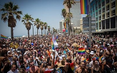 People take part in the annual Gay Pride Parade in Tel Aviv on June 8, 2018. (Miriam Alster/Flash90)
