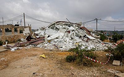 The remains of a bulldozed home in the Netiv Ha'avot outpost on June 13, 2018. (Gershon Elinson/Flash90)