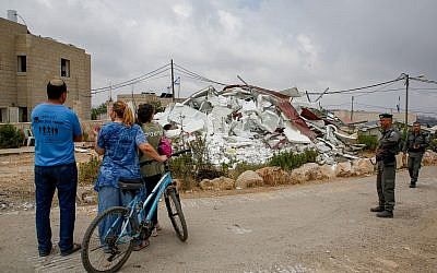 The remains of a bulldozed home in the Netiv Ha'avot outpost on June 13, 2018. (Gershon Elinson/Flash90)