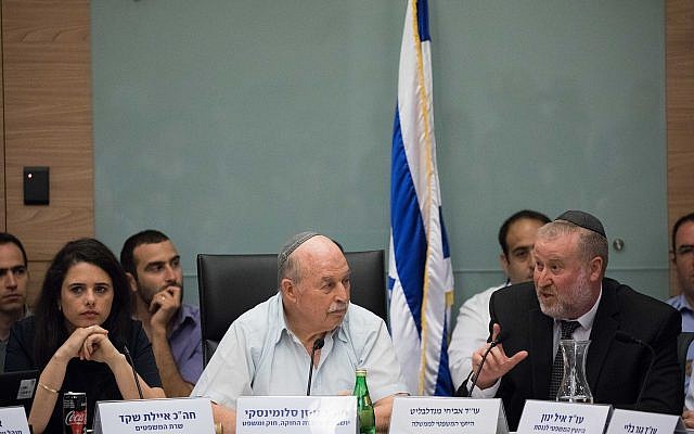 The Constitution, Law and Justice Committee chairman Nissan Slomiansky (C), Justice Minister Ayelet Shaked (L) and Attorney General Avichai Mandelblit attend a committee meeting at the Knesset on June 25, 2018. (Yonatan Sindel/Flash90) The Constitution, Law and Justice Committee chairman Nissan Slomiansky (C), Justice Minister Ayelet Shaked (L) and Attorney General Avichai Mandelblit attend a committee meeting at the Knesset on June 25, 2018. (Yonatan Sindel/Flash90)