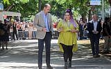 Prince William, Duke of Cambridge, walks with the winner of the Eurovision 2018 song contest, Netta Barzilai, on Rothschild Boulevard in Tel Aviv on June 27, 2018. (Marc Israel Sellem/pool/via Flash90)