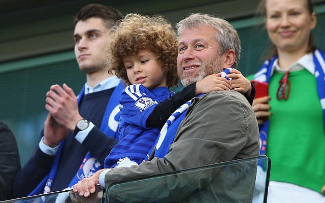 Chelsea owner Roman Abramovich looks on as Chelsea win the Premier League title after the Barclays Premier League match between Chelsea and Crystal Palace at Stamford Bridge on May 3, 2015 in London, England. (Clive Mason/Getty Images via JTA) Chelsea owner Roman Abramovich looks on as Chelsea win the Premier League title after the Barclays Premier League match between Chelsea and Crystal Palace at Stamford Bridge on May 3, 2015 in London, England. (Clive Mason/Getty Images via JTA)