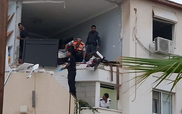 Investigators examine the scene after a gas explosion in the southern city of Sderot, June 8, 2018. (Courtesy Magen David Adom) Investigators examine the scene after a gas explosion in the southern city of Sderot, June 8, 2018. (Courtesy Magen David Adom)