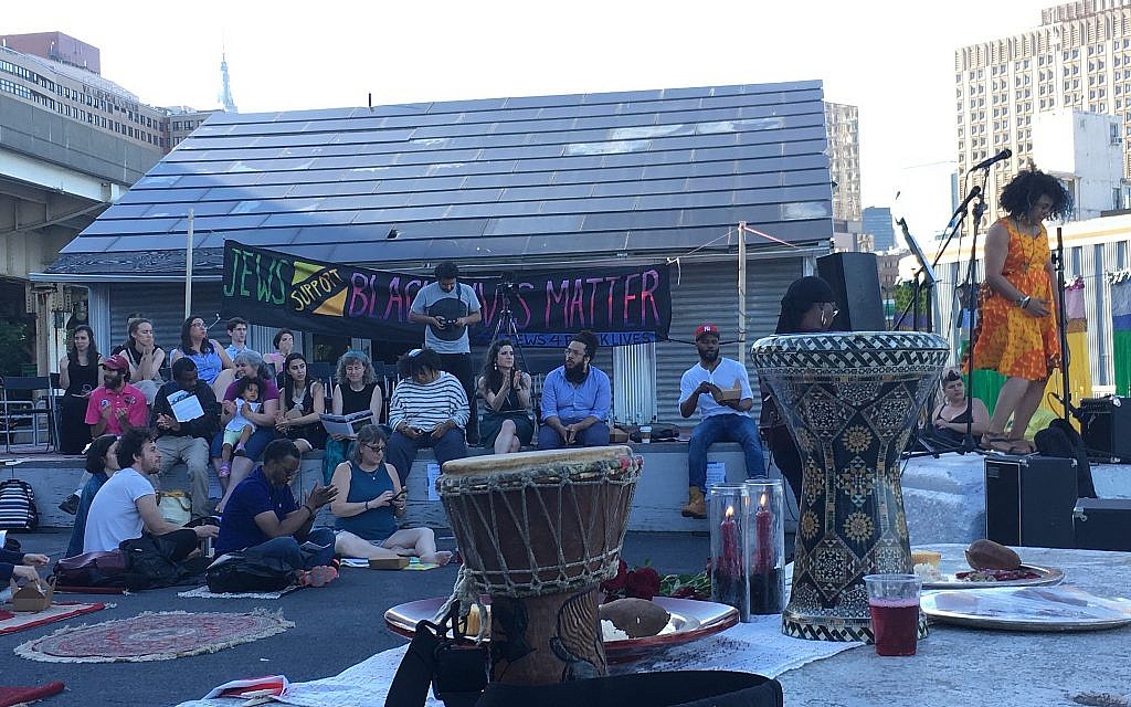 Drums were present at the 'maggid' portion of the Juneteenth seder put on by JFREJ, held alongside the East River in New York City on June 14, 2018. (Steven Davidson/ Times of Israel)