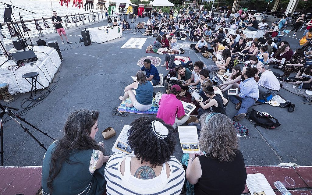Attendees at the Juneteenth seder put on by JFREJ, held alongside the East River in New York City on June 14, 2018. (Rafael Shimunov)