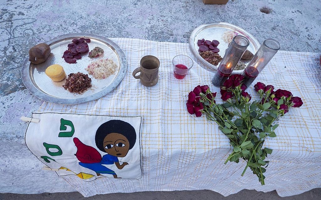 A seder plate setting at the Juneteenth seder put on by JFREJ, held alongside the East River in New York City on June 14, 2018. (Rafael Shimunov)