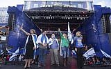 Illustrative: Israel’s consul Dori Goren, center, joins Evangelical Christians, who waved Israeli flags and prayed for the Jewish state during the March for Jesus on May 31, 2018, in Sao Paulo. (Courtesy/Israel’s consulate in Sao Paulo)