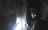 An IDF soldier arrests a member of a suspected Hamas cell in Nablus, in the northern Gaza Strip in April 2018. (Shin Bet)