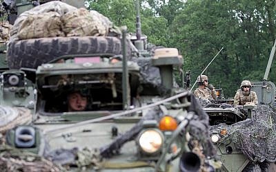 American soldiers prepare for a training exercise during the Saber Strike event in Poland, June 1, 2018. (U.S. Army Reserve photo by Capt. Jeku Arce, 221st Public Affairs Detachment)
