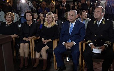 Russian Ambassador to Israel Anatoly Viktorov, right, sits next to Prime Minister Benjamin Netanyahu at a reception marking Russia Day in Sergei’s Courtyard, Jerusalem, June 14, 2018 (Amos Ben-Gershom/GPO)