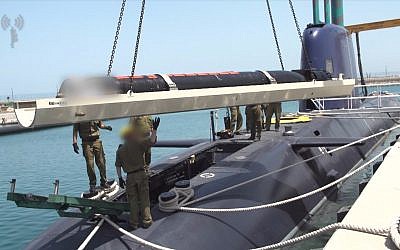 A June 19, 2018 photo of an Israeli Navy submarine being outfitted with a smart new torpedo system. (IDF Spokesperson's Unit)